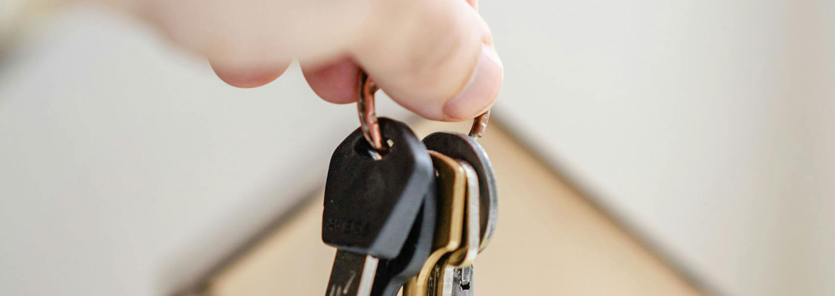 image of house beeing being handed off